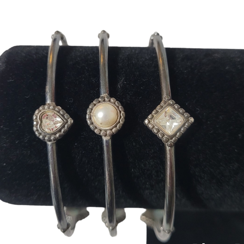 Set of 3 Gun Metal Gray bracelets.Each with a different Rhinestone shape.